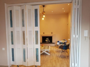 Cheerful 2-bedroom residential home with a garden